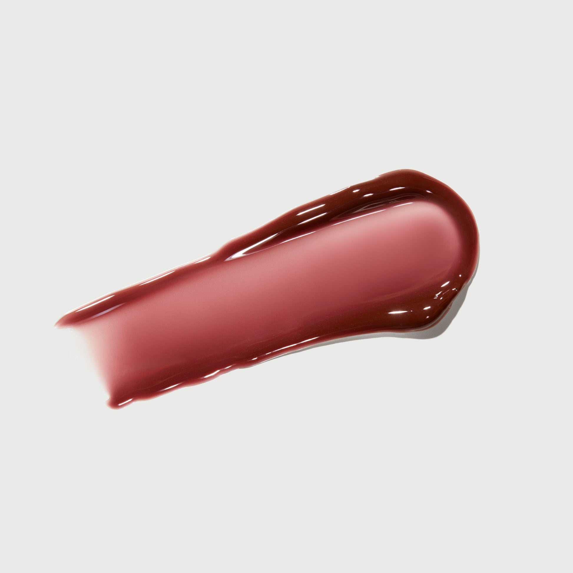 phyto-glow-lip-balm-crimson-b3 NATR-10122-Swatch-Phyto-Glow-Crimson-bonebkgd.jpg