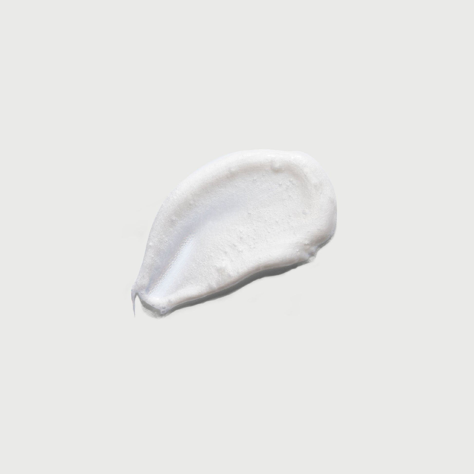 the-smoother-glycolic-acid-exfoliating-body-wash-a6 NATR-40002-Swatch-The-Smoother-Glycolic-Acid-Exfoliating-Body-Wash-bonebkgd.jpg
