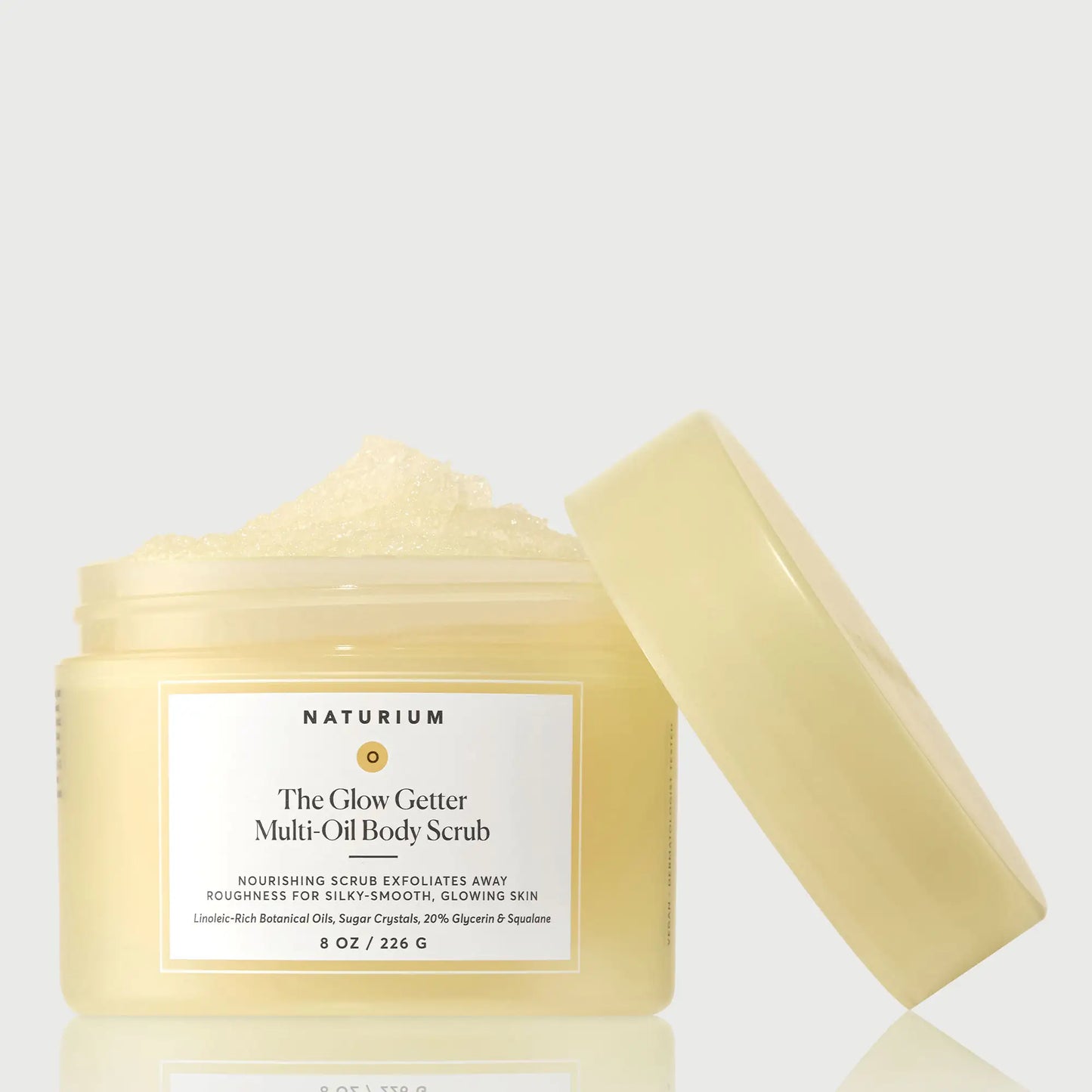 the-glow-getter-multi-oil-body-scrub-y4 NATR-40028-GlowGetter-Multi-Oil-Body-Scrub-Front-CapOff-bonebkgd.webp