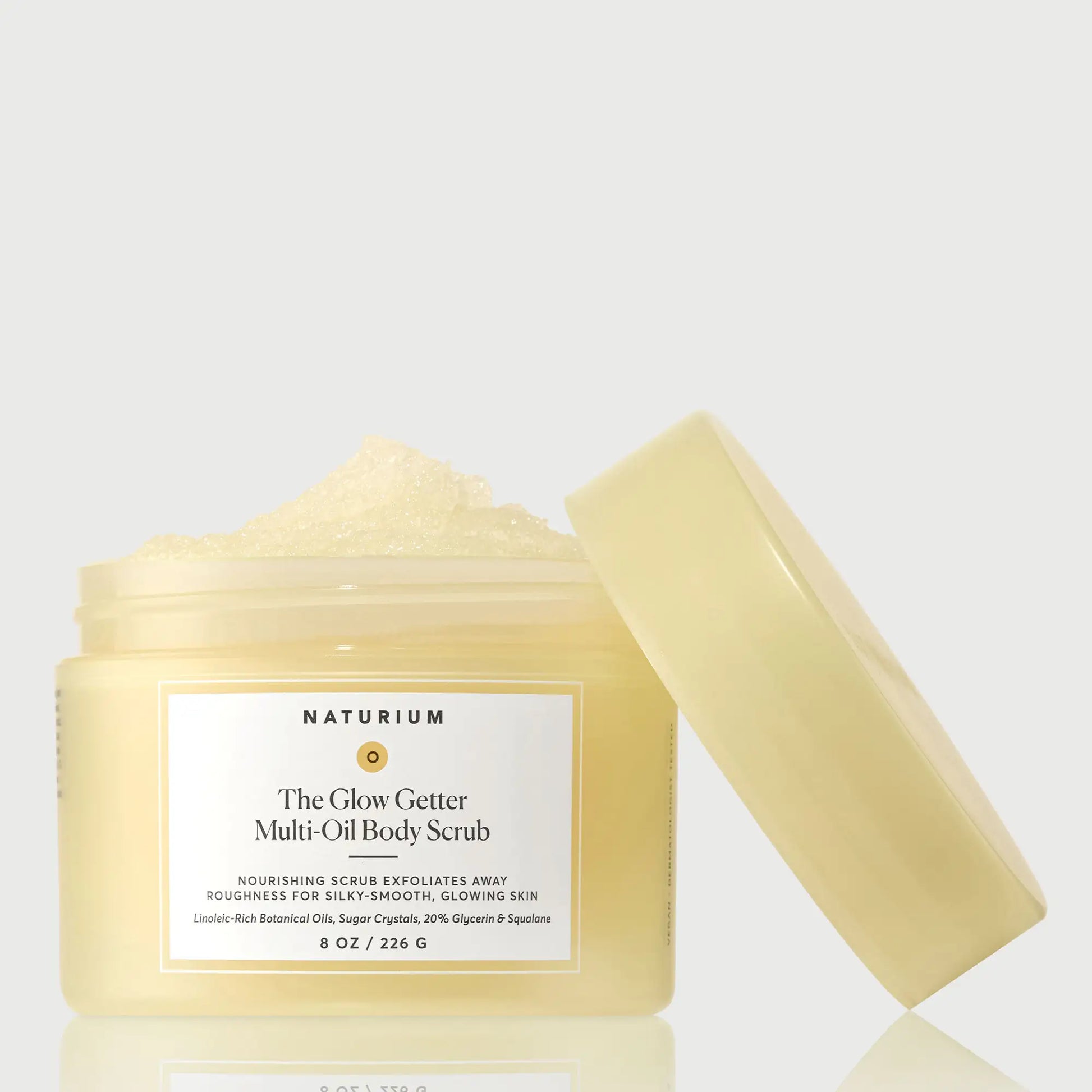 the-glow-getter-multi-oil-body-scrub-y4 NATR-40028-GlowGetter-Multi-Oil-Body-Scrub-Front-CapOff-bonebkgd.webp