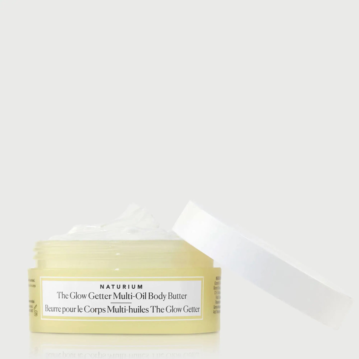 the-glow-getter-multi-oil-body-butter-travel-size-m9 NATR-40115_Glow-Getter-Body-Butter-Mini_front_capoff_bonebkgd.webp