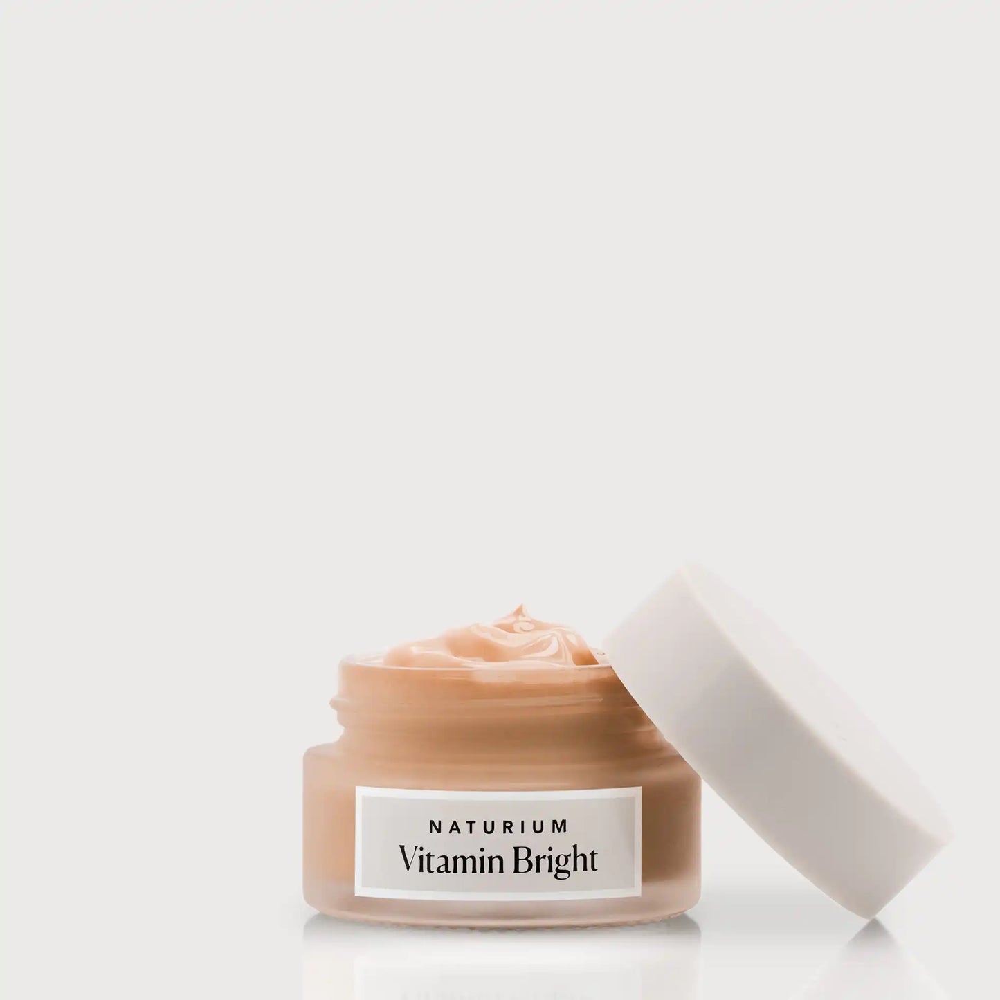 vitamin-bright-illuminating-eye-cream-j9 NATR-VitaminBright_DEEP_Primary_front_openjar_bone.webp